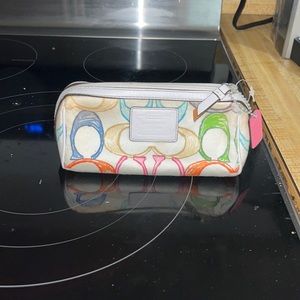 Small Coach makeup bag
